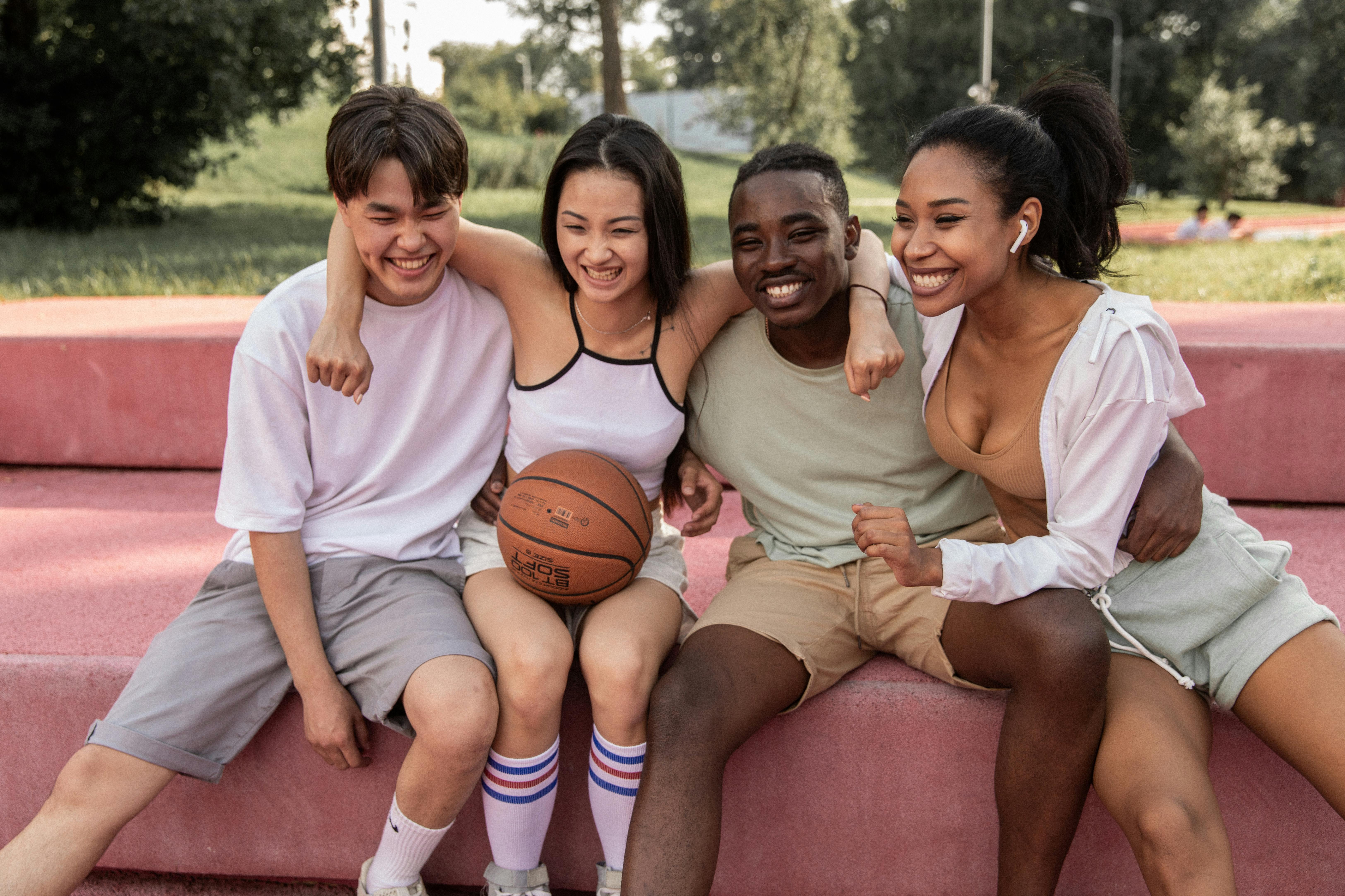 Group of friends playing sports together